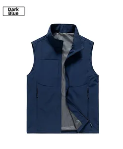 Detail view of dark blue outdoor vest featuring breathable mesh lining and zipper pockets