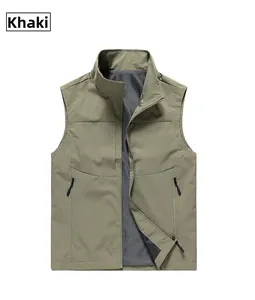 Detail of khaki outdoor vest showing stand collar, zipper pockets and mesh lining
