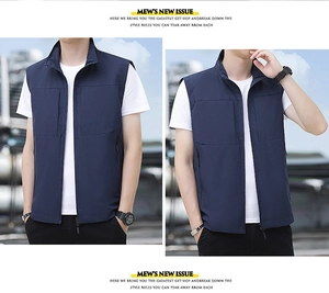 Detail view of navy blue outdoor vest with stand collar and large utility pockets