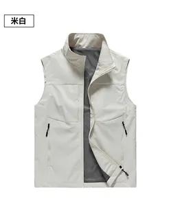 Detail view of off-white outdoor vest showing grey mesh lining and side zipper pockets