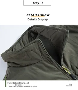 Detail of grey outdoor vest featuring a stand collar and durable ripstop fabric texture