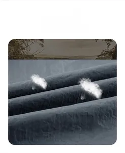 Detail of grey lightweight breathable sun protection fabric with soft natural texture