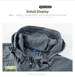 Detail of hooded sun protection jacket featuring breathable fabric and adjustable drawstrings