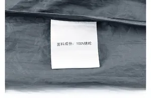 Close-up of 100% nylon cooling fabric label on sun protection jacket for men