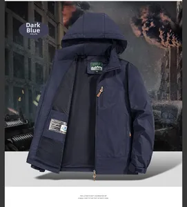 Detail of dark blue outdoor jacket showing breathable mesh lining and interior label