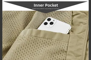 Detail of the tactical jacket khaki interior mesh pocket with smartphone storage