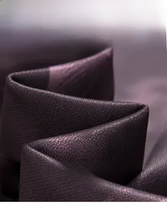 Close-up of wrinkle-resistant cotton-polyester blend fabric with fine twill texture