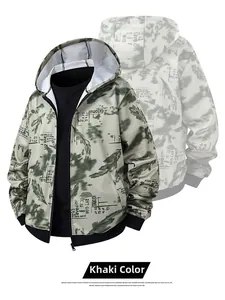 Detail of khaki men's camouflage hooded jacket with feather patterns and ribbed cuffs