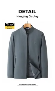 Close-up of gray men's jacket featuring a stand collar and subtle vertical wave texture
