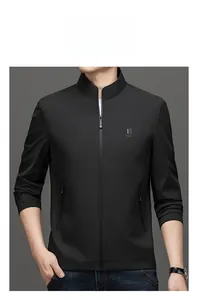 Close-up of a men's black stand-collar jacket featuring a metal zipper and chest logo