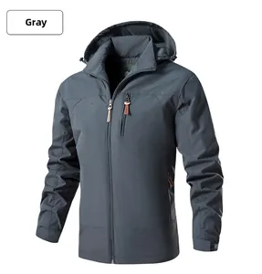 Detail of grey outdoor jacket featuring windproof fabric, fleece lining, and chest zip pocket