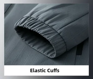 Detail view of dark grey jacket featuring elastic cuffs and twill textured fabric