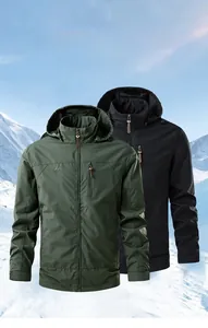 Detail of outdoor jacket with windproof fabric, embroidered logo and chest zipper pocket