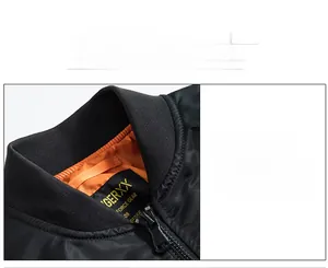 Détail du col baseball côtelé et de la doublure orange sur le blouson bomber noir