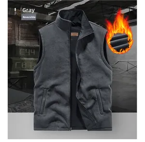 Detail of reversible gray fleece vest showing plush lining and stand collar for winter