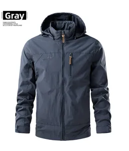 Detail view of a gray windproof jacket with hooded collar and zippered chest pocket