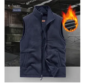 Detail of reversible blue fleece vest for men showing zippered pockets and warm interior