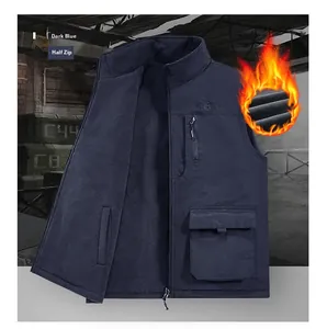 Detailed view of deep blue thermal fleece lining and multi-pocket design on utility vest