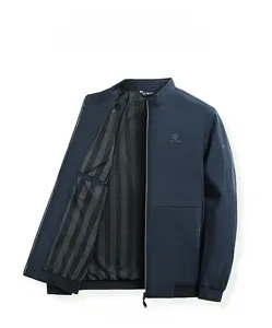 Detail of navy blue business jacket showing standing collar and striped inner lining