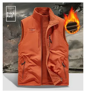 Detail of brick red fleece-lined outdoor vest with zippered chest pocket and stand collar