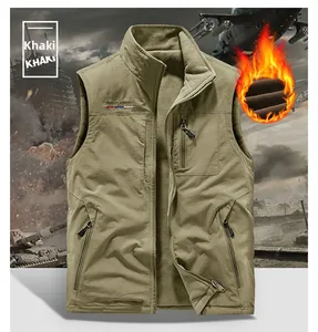 Detail of khaki outdoor vest showing stand collar, zipper pockets and warm fleece lining