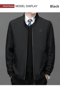 Detail of a black business casual jacket with a stand collar and ribbed hem on a model