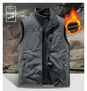 Detail of gray windproof vest featuring warm fleece lining and chest logo embroidery