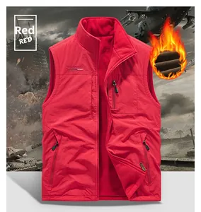 Detail of red windproof vest with warm fleece lining and secure zipper pockets