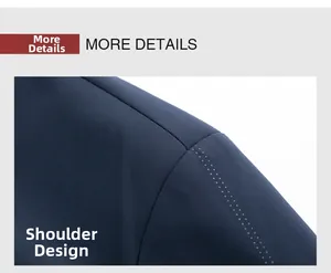 Detail of navy business jacket shoulder showing precise stitching and dotted texture