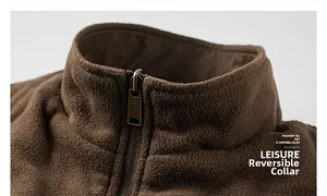 Detail of the inner fleece collar and sturdy metal zipper on a warm brown outdoor vest