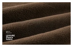 Close-up of thick polar fleece fabric texture showing soft fibers and warm material