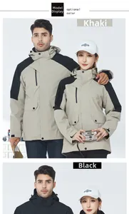 Detail view of 3-in-1 outdoor waterproof jacket in khaki and black with detachable hood