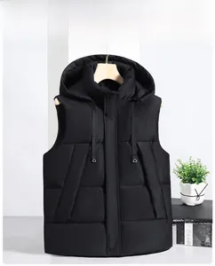 Detail of black hooded puffer vest showing drawstring hood and snap-button zipper closure
