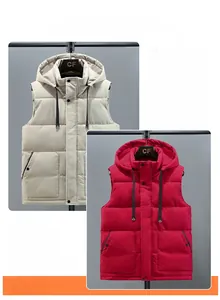 Detail of hooded puffer vest showing the zipper closure, side pockets, and padded structure