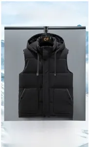 Detail of a black hooded winter vest with quilted windproof fabric and drawstring hood