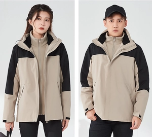 Detail of 3-in-1 waterproof hiking jacket with detachable fleece lining and hood