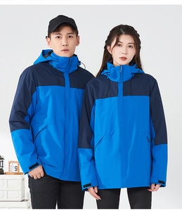 Close-up of waterproof hooded jackets with zipper pockets and velcro cuffs for outdoors