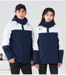 Detail of waterproof 3-in-1 jacket showing adjustable hood and velcro cuff closure