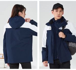 Detail of waterproof 3-in-1 hiking jacket with adjustable hood and velcro cuffs