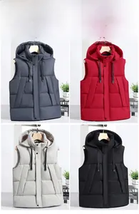 Detail showing color display of hooded quilted puffer vests in grey, red, beige and black
