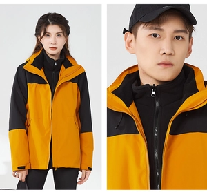 Detail of waterproof outdoor jacket with detachable liner and adjustable cuffs for hikers