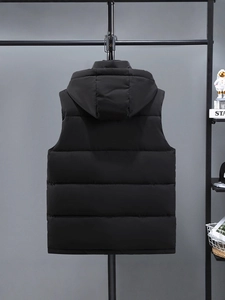 Rear view of a heavy black hooded puffer vest with horizontal stitching and windproof fabric