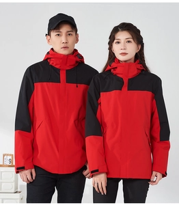Close-up of waterproof mountain jacket with windproof hood and red-black color block