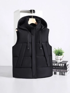 Men's black hooded padded vest with premium quilted texture and adjustable drawstring hood