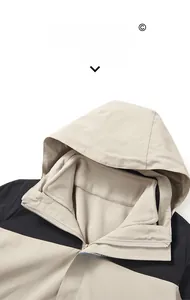 Detail of windproof hooded collar and warm fleece lining on outdoor jacket