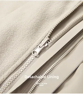 Detail of the detachable fleece liner and double zipper system of the 3-in-1 jacket