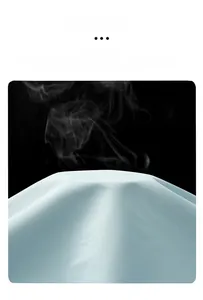 Macro shot showing high breathability of the light blue outdoor jacket fabric material