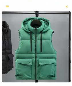 Detail shot of green hooded puffer vest featuring utility pockets and durable nylon texture