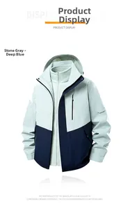Detail view of 3-in-1 outdoor jacket in gravel gray and deep blue with fleece lining