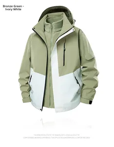 Detailed close-up of 3-in-1 bronze green and ivory white jacket with removable fleece liner